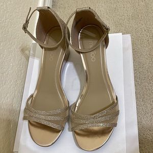 Gold sparkling shoes